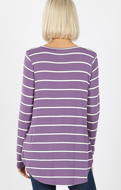 Women’s knit striped tunic by Ochre Ismene, featuring a cozy, casual design with multicolored horizontal stripes.