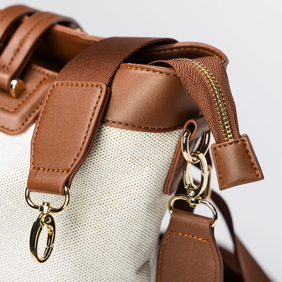 Maroon Chronos canvas tote diaper bag with multiple pockets and sturdy handles, ideal for parenthood accessories and baby essentials.