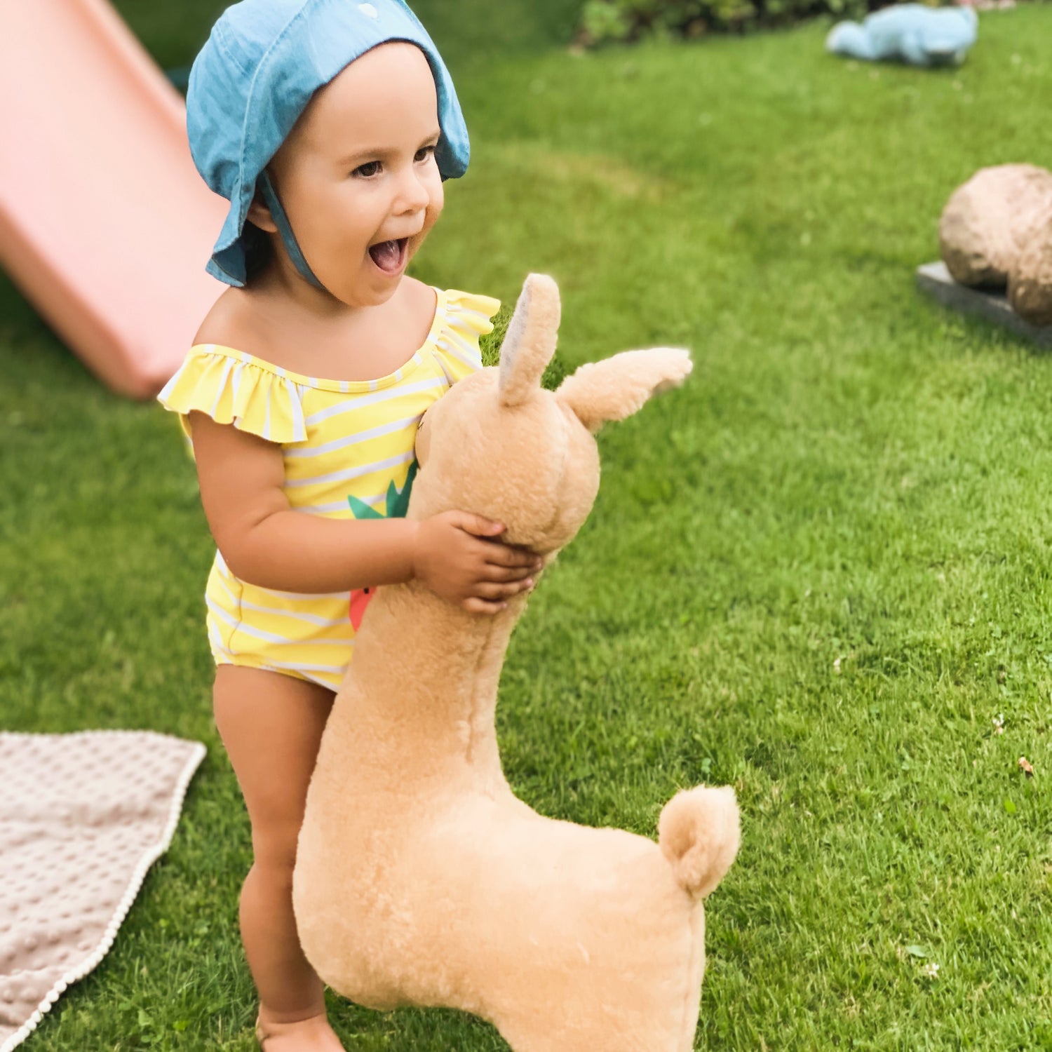 Rusty brown Ochre Ares soft toy alpaca pillow with a cuddly, plush texture, ideal for comfort and decoration.