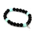 Angelite and black agate beaded bracelet with 8mm beads, stylish jewelry by Tan Coconut featuring calming blue and black stones.