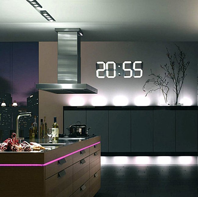 Digital LED Wall Clock by Fuchsia Molly displaying time on a sleek modern clock with bright red LED digits.