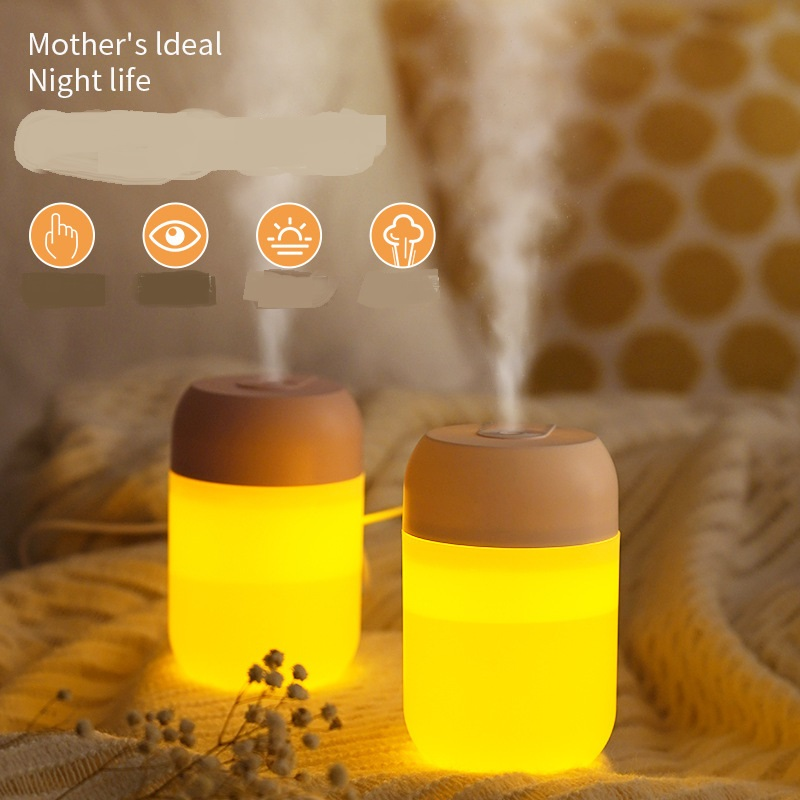 Lilac Milo mini portable ultrasonic air humidifier and aroma essential oil diffuser showing a sleek white device with mist and control buttons.