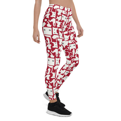 Women’s white cat silhouette on red leggings by Start2Finish, featuring a stylish feline design on stretchy, comfortable fabric.