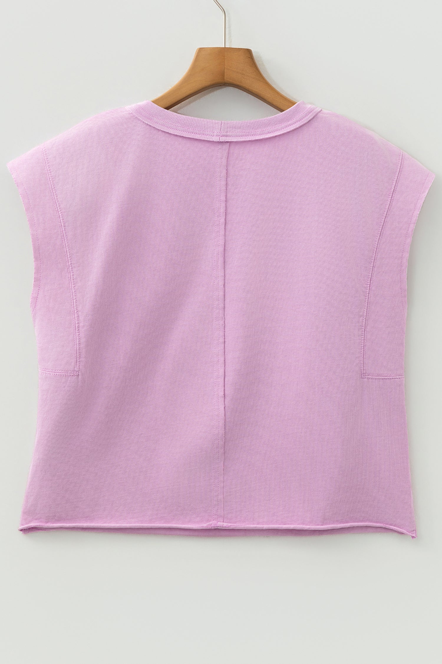 Byzantium Bay solid mineral wash boxy tank top displayed on a hanger, showcasing its relaxed fit and soft fabric.