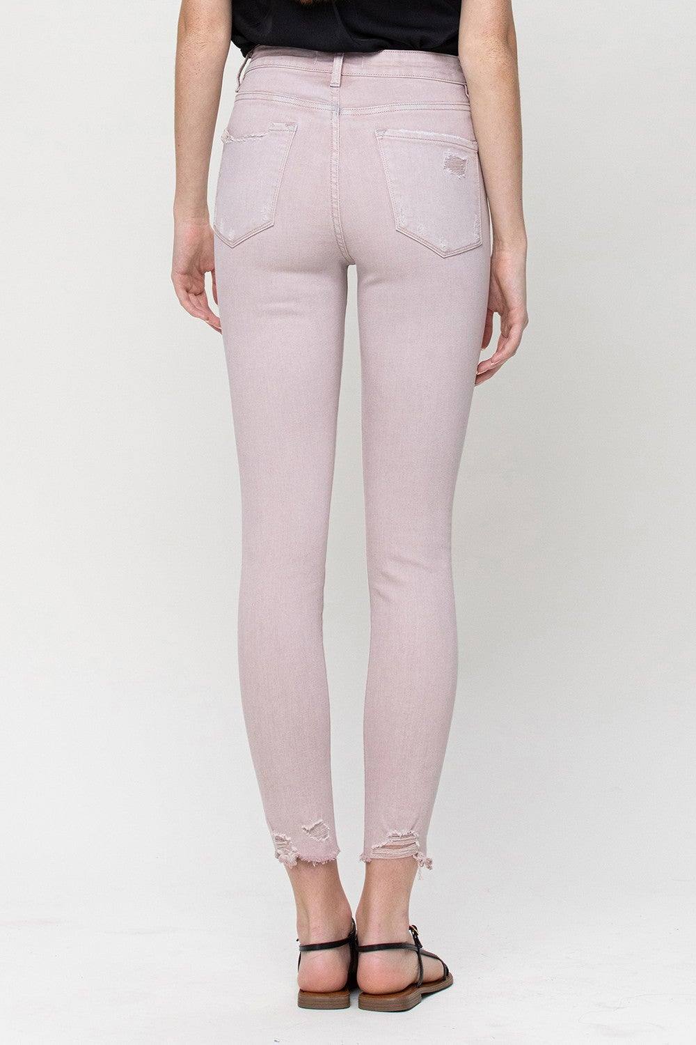 Ochre Ismene Ververt Peony distressed jeans with a casual fit and ripped details displayed on a model.