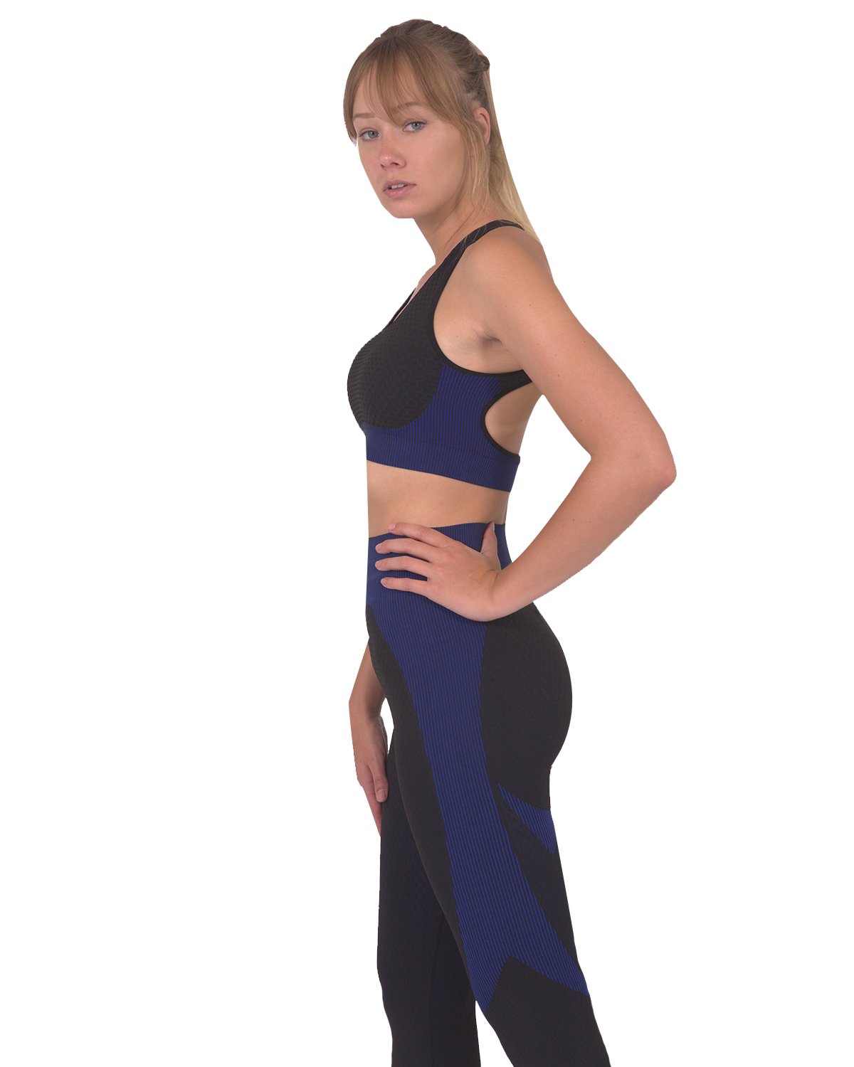 Lazurite Trois seamless sports bra in black with navy accents, activewear, soft fabric, and supportive fit for workouts.