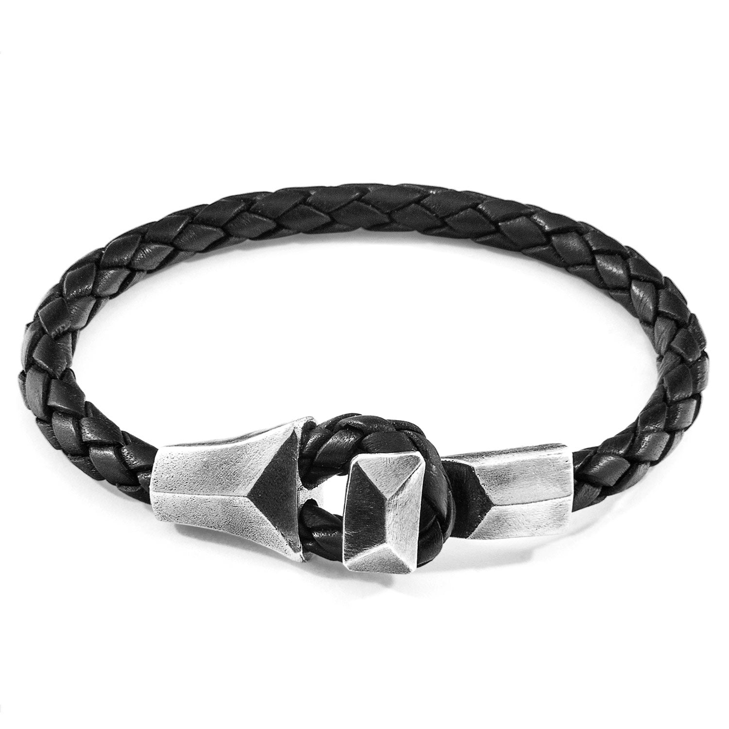 Midnight black Alderney silver and braided leather bracelet by Magenta Sooty, featuring silver accents and intricate leather weaving.
