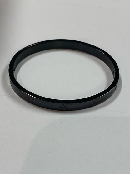 Black Zilarra Love Bracelet by Lazurite featuring delicate chain design and small heart charms on a neutral background.