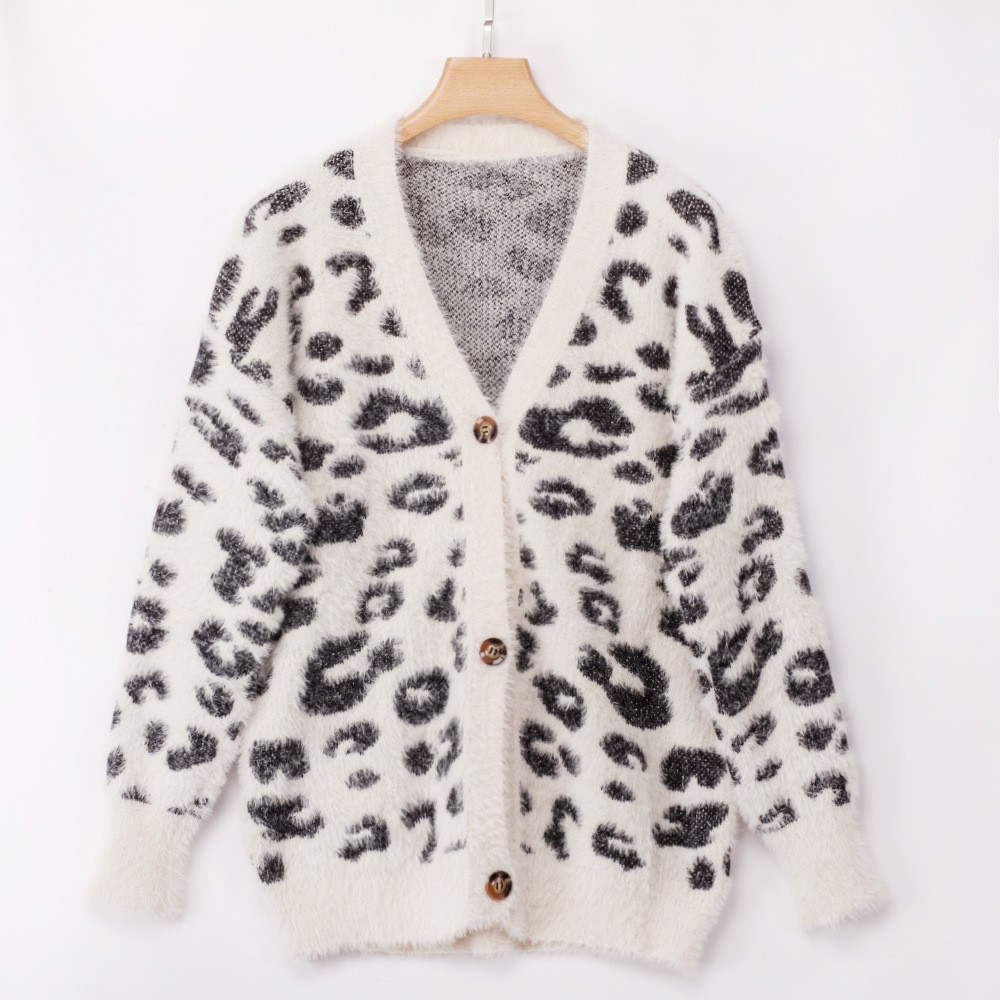 Carmine Juneberry leopard print long sleeve small cardigan sweater, cozy knit with button closure and ribbed cuffs.