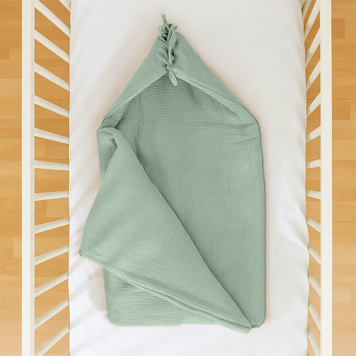 Green Organic Cotton Bunting Bag for kids and babies by Chocolate Briseis, with colorful bunting design and soft fabric.