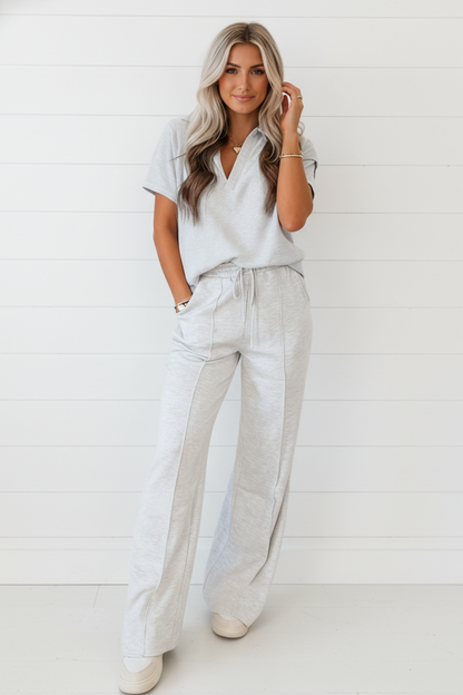 Byzantium Bay solid sporty polo tee and drawstring pants set, casual athletic wear for men or women, in a matching color.
