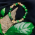 Tan Saffron Bark Agate and black green stone chip stretch bracelet featuring polished beads and elastic stretch design.
