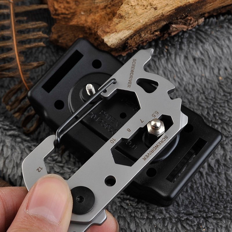 Fuchsia Molly 14-in-1 outdoor camping multi tool with various fold-out tools for camping and outdoor activities.