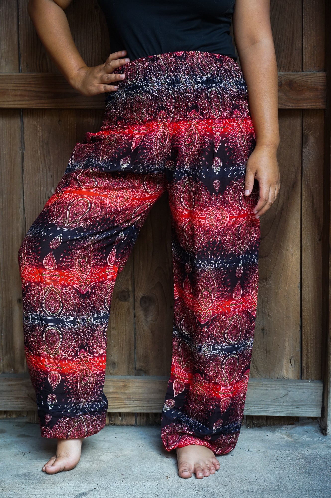 Tan Smokey striped harem pants with paisley and boho design, featuring loose fit and comfortable harem-style silhouette.