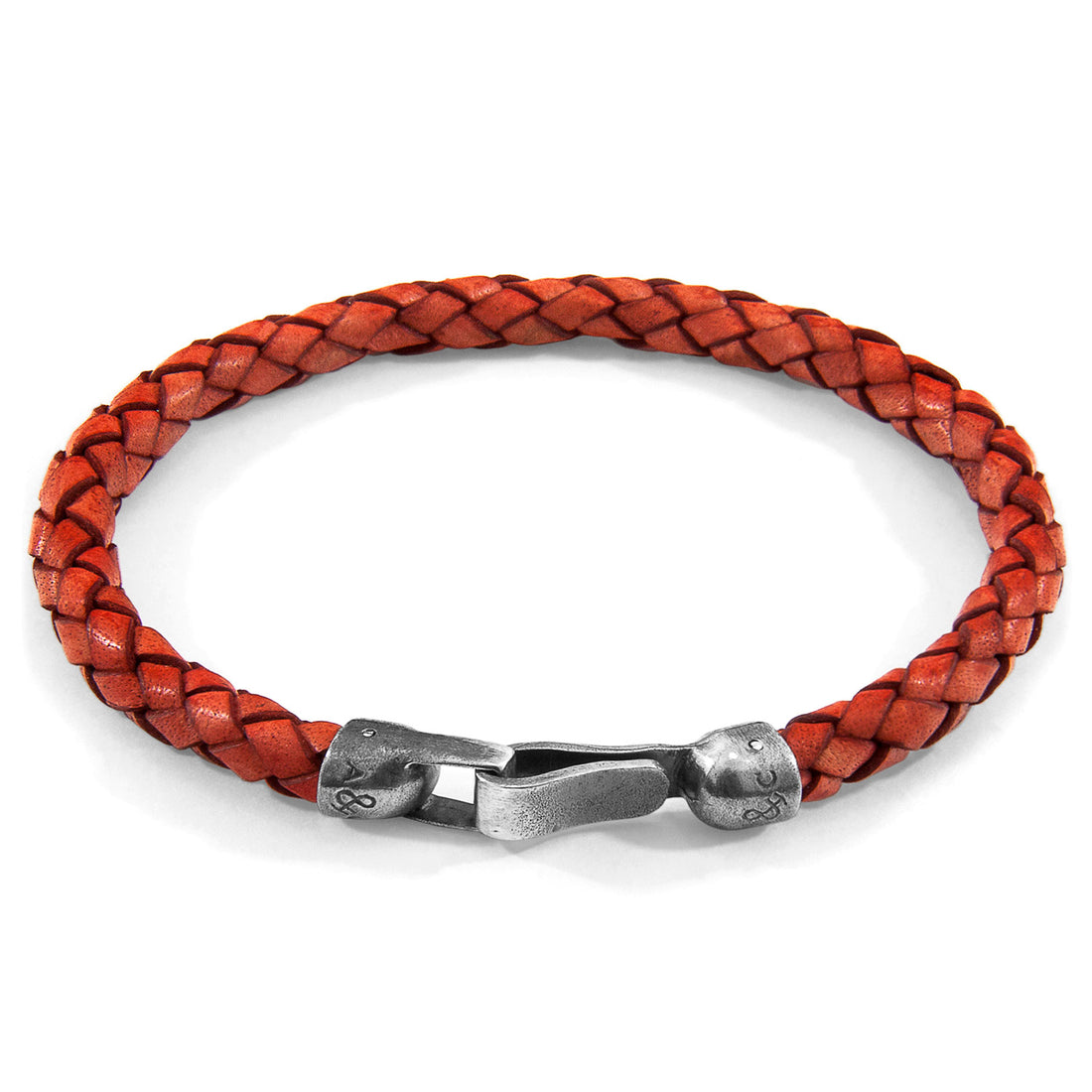Amber Red Skye silver and braided leather bracelet by Magenta Sooty featuring a mix of polished silver and woven leather strands.