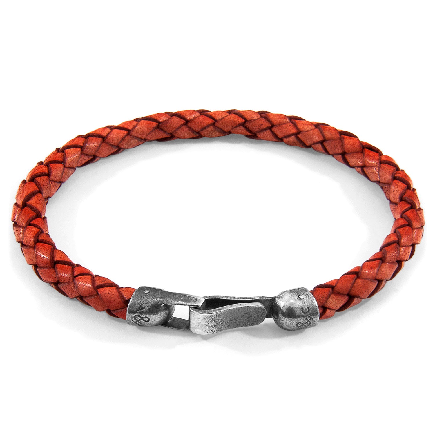 Amber Red Skye silver and braided leather bracelet by Magenta Sooty featuring a mix of polished silver and woven leather strands.