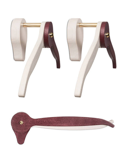 Orange Millie CASANOVA SUMMER wall hangers with two trouser hangers, made for organization and closet storage.