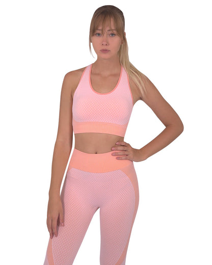 Lazurite Trois seamless pink sports bra for activewear, featuring a snug fit and smooth fabric for comfortable workout support.