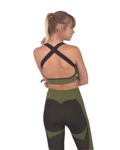 Lazurite Trois seamless sports bra in black with green accents, activewear designed for comfort and support during workouts.