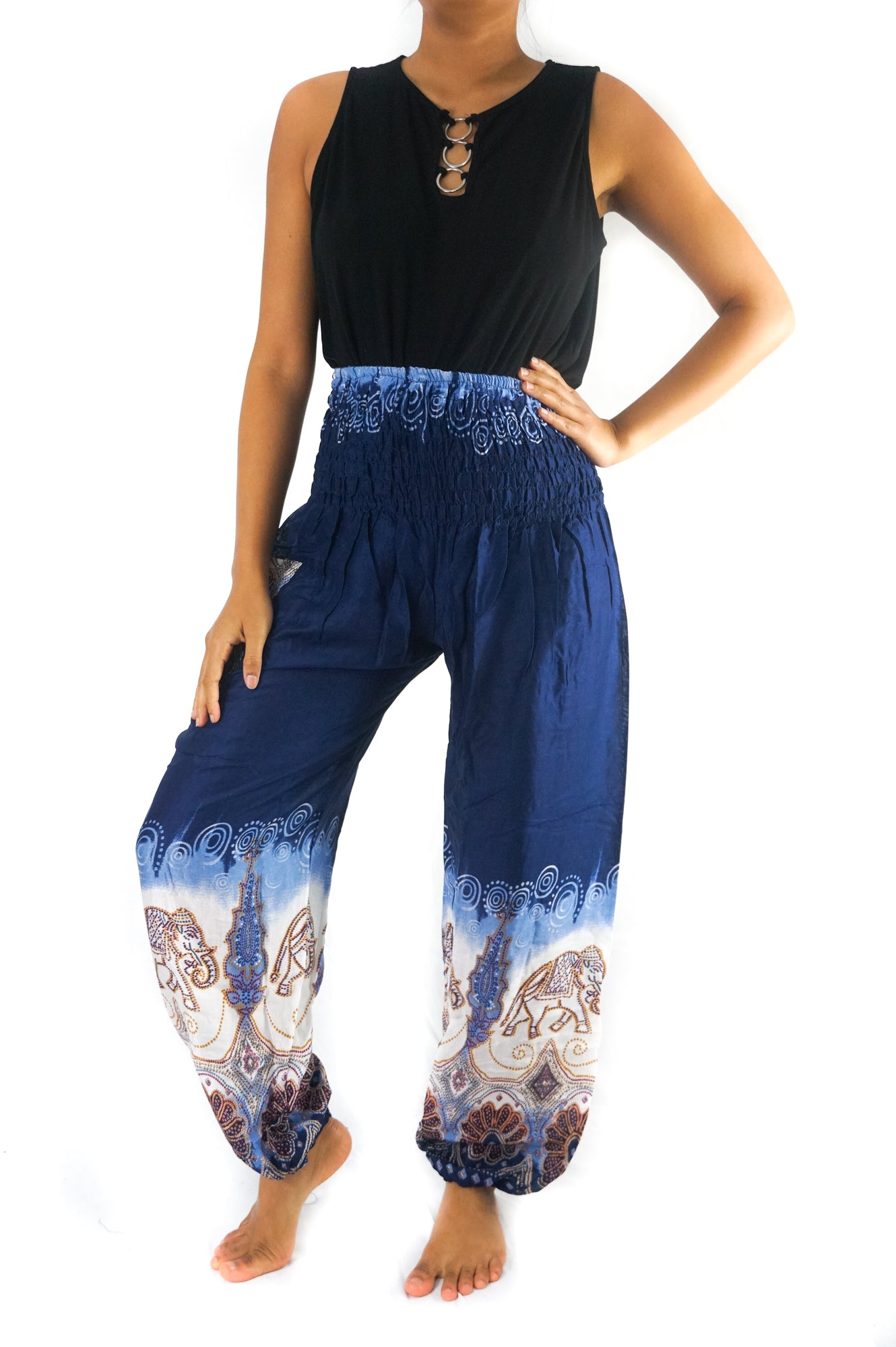 Blue elephant print boho yoga pants for women by Tan Smokey, featuring a relaxed fit and comfortable hippie style.