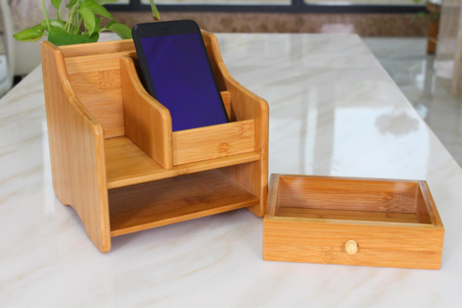 Fuchsia Molly bamboo storage box for organization, showing a natural bamboo finish and compact rectangular design.