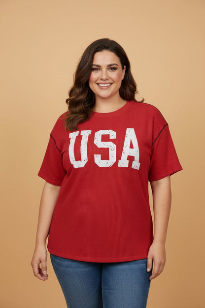 Plus size USA corded knit graphic T-shirt for women by Byzantium Bay, featuring a colorful American flag design.