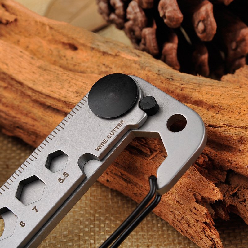 Fuchsia Molly 12-in-1 camping multi-tool with various fold-out tools and a compact design for outdoor camping activities.