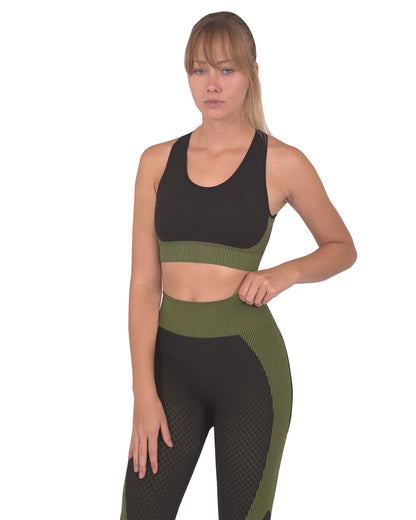 Lazurite Trois seamless black and green sports bra for activewear, with a snug fit and breathable fabric.