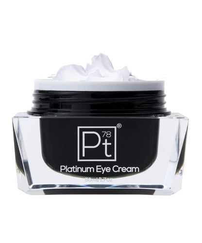 Amaranth Daisy Platinum Eye Cream in a sleek jar, showcasing a luxurious skincare product for brightening and reducing puffiness around the eyes.