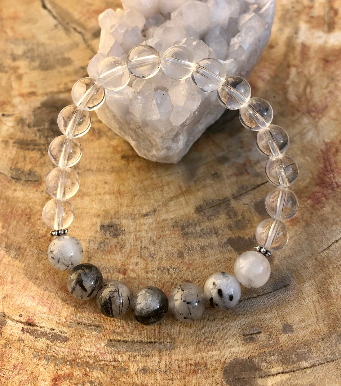 Black tourmaline and crystal quartz stretch bracelet featuring genuine crystals, designed by Violet Chaos for protective and healing energy.