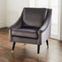 Luxury gray velvet Grace armchair by Harlequin Metis, featuring plush upholstery and elegant design for stylish living spaces.