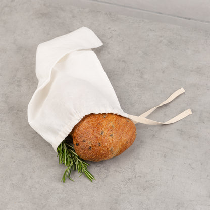 Off-white linen bread bag by Biotite, kitchen storage accessory with a simple, natural design for fresh bread storage.
