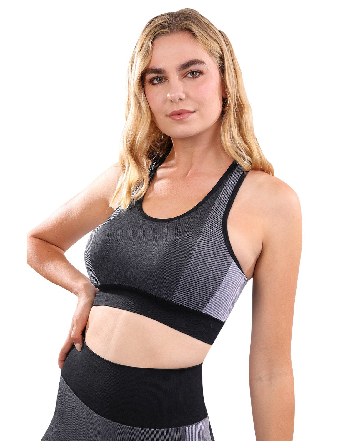 Black Arleta seamless sports bra for women by Lazurite, showing a close-up of the comfortable, stretchy fabric and supportive design.