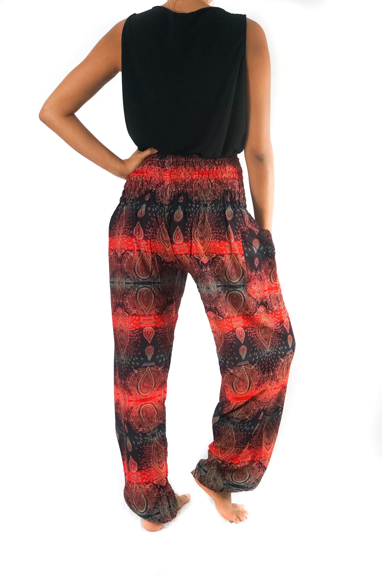 Tan Smokey striped harem pants featuring boho paisley patterns and a relaxed, flowy fit with a comfortable waistband.