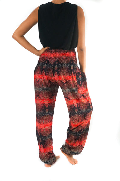 Tan Smokey striped harem pants featuring boho paisley patterns and a relaxed, flowy fit with a comfortable waistband.