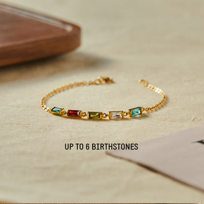 Green Millie mom bracelet featuring a colorful birthstone, showcasing a delicate and stylish jewelry piece for moms.