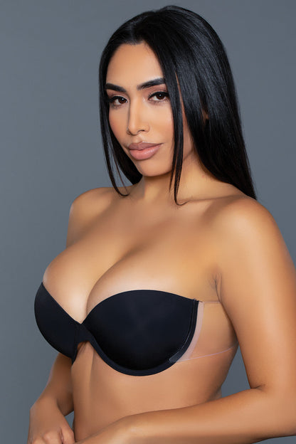 Magenta Caeneus strapless adhesive bra for seamless support and discreet wear, shown on a plain background.