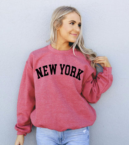Agate New York sweatshirt featuring a cozy, casual design with a city-inspired graphic on soft fabric.