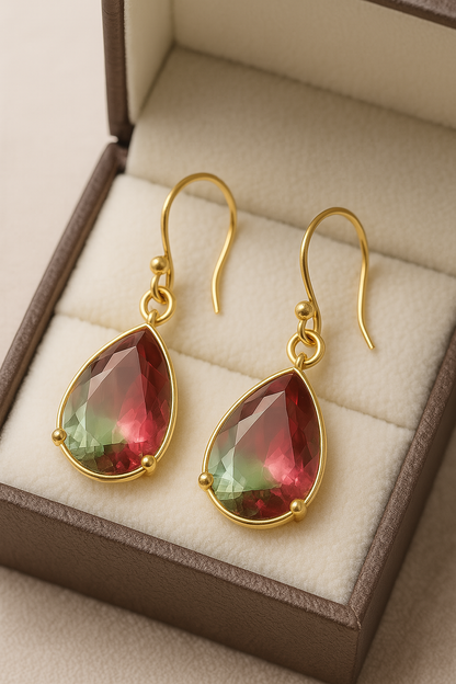 Elegant drop-shaped earrings with green and pink glass beads on 18K gold hooks, stylish jewelry by Apricot Perses.