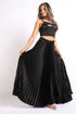 Black satin maxi skirt with high waist and pleated A-line design by Puce Juniper, shown with flowing fabric and elegant style.