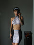 Sexy French Maid lingerie set by Brown Hercules featuring black lace and satin, includes a corset, apron, and matching accessories.