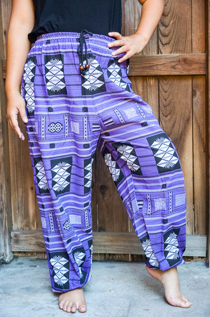 Tan Smokey cotton boho pants with tribal and hippie-inspired patterns, featuring a relaxed fit and comfortable waistband.