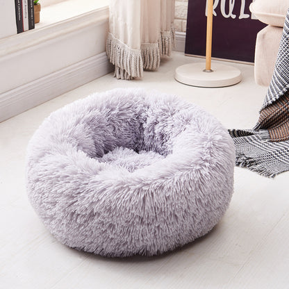 Super soft long plush Teal Simba pet bed with cushioned sides and cozy interior for calming comfort.