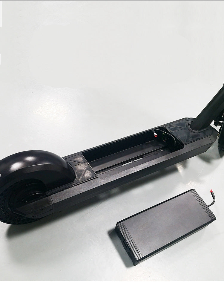 Teal Simba 10-inch electric folding scooter with disassembled battery and frame, suitable for outdoor sports and commuting.