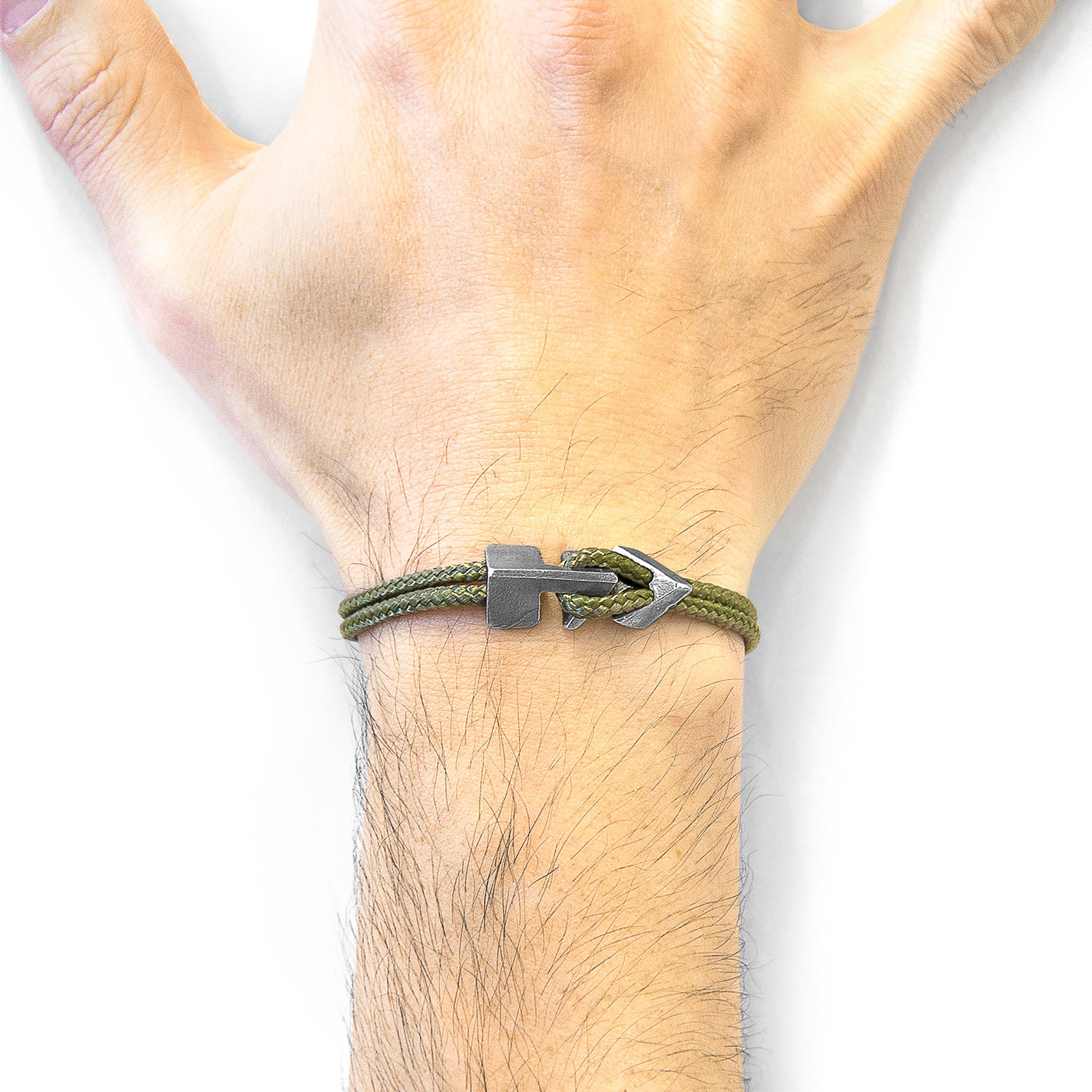 Khaki green Brixham silver and rope bracelet by Magenta Sooty showcasing a stylish woven design and silver accents.
