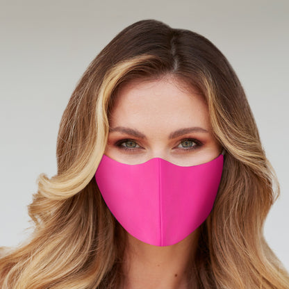 Solid neon pink face mask for women by Cyan Poppy, made of soft fabric, designed for comfortable everyday wear