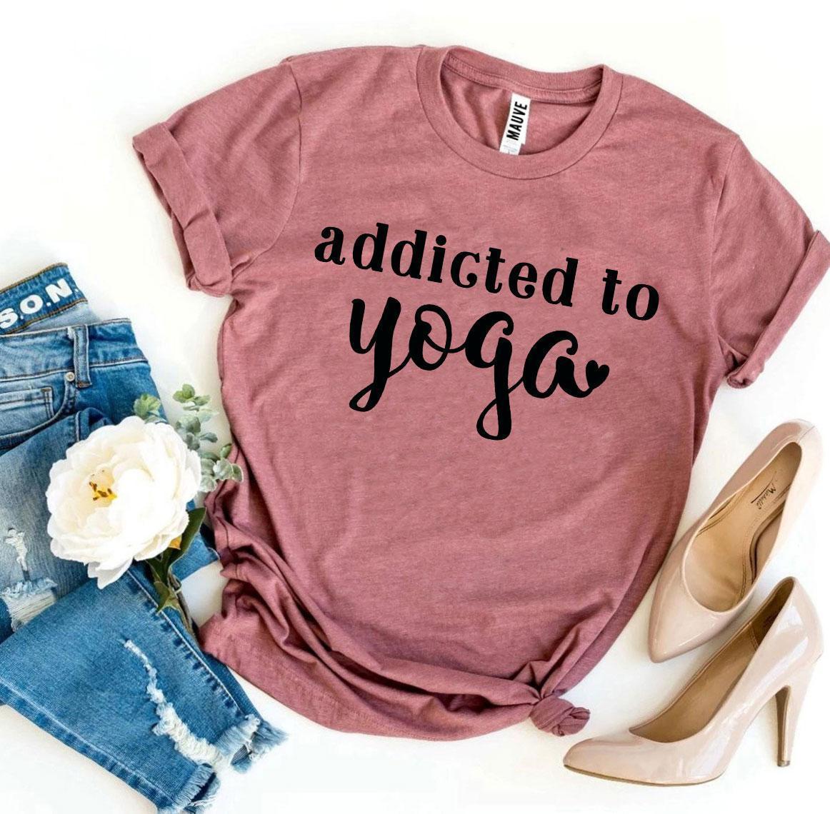 Agate Addicted To Yoga T-shirt featuring a casual fit and yoga-themed graphic on soft fabric.