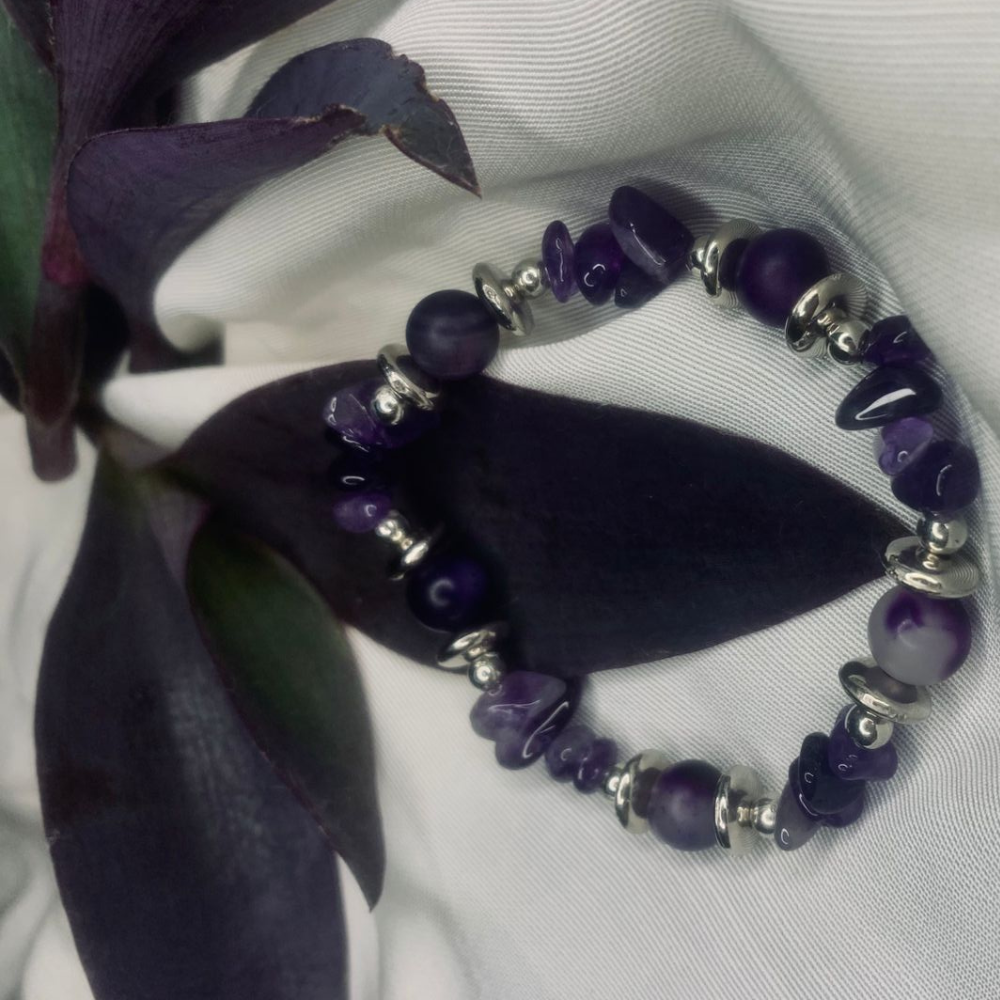 Purple agate chip bracelet by Tan Saffron featuring silver spacers in bohemian style, showcasing vibrant purple gemstone chips.