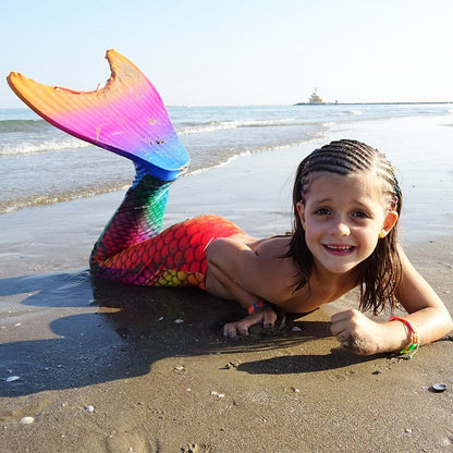Fuchsia Molly mermaid swimsuit towel featuring vibrant mermaid scale design and soft, absorbent fabric for beach or pool use.