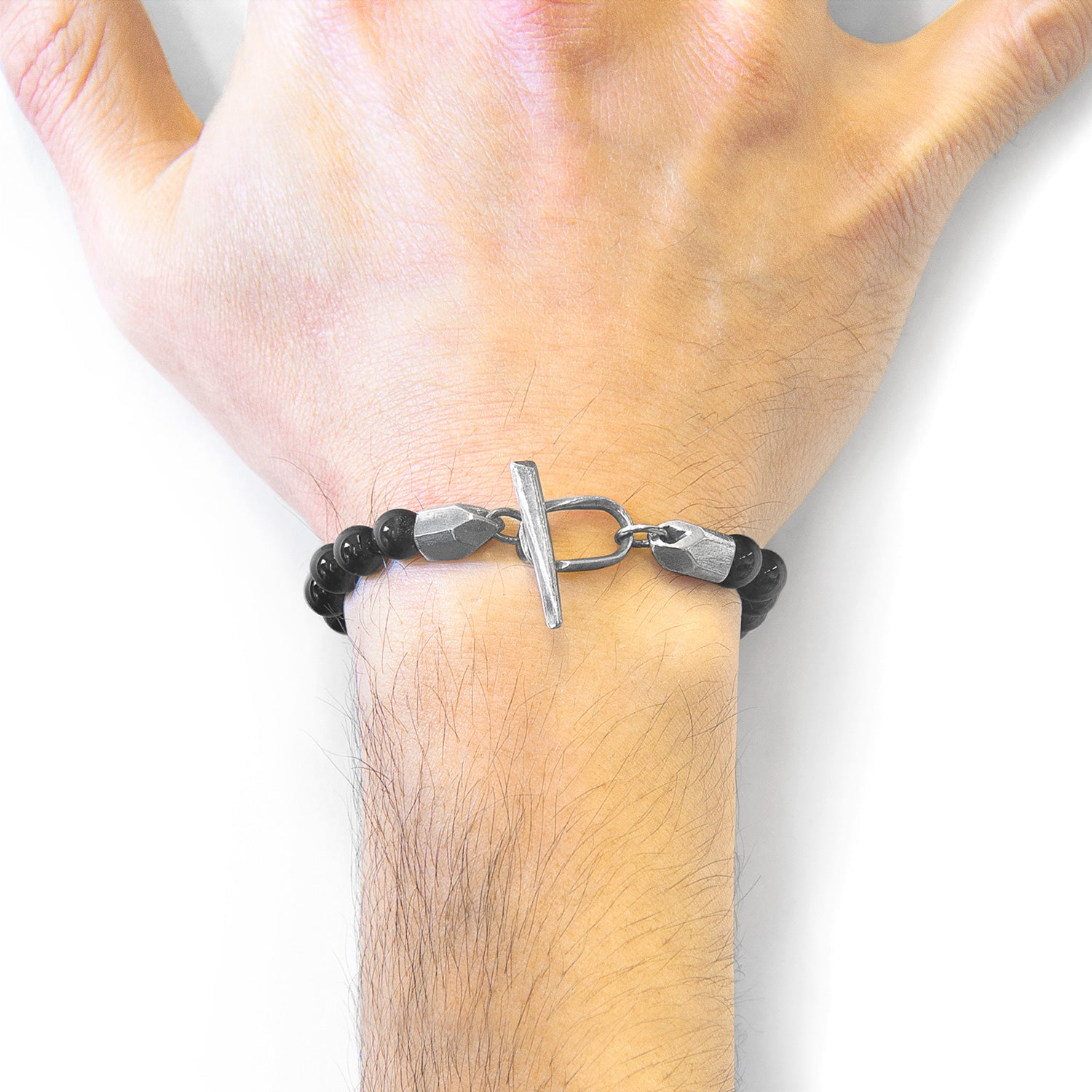 Black Onyx Tinago Silver and Stone Beaded Bracelet featuring black onyx, silver beads, and colorful stones on a delicate bracelet.